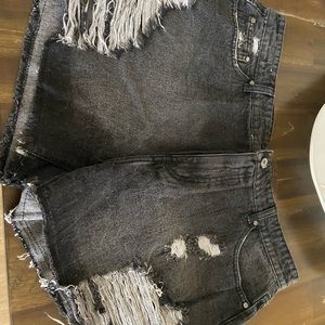 Brand new. Never worn distressed jean shorts.